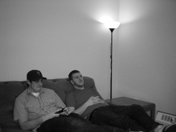 The two co-founders gaming on a couch