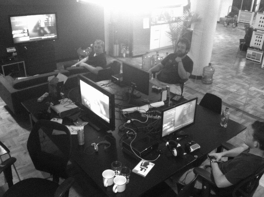 The first studio, desks covered in screens and controllers